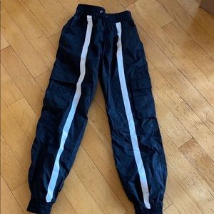 Revolve Danielle Guizio Black Track pants. NWOT